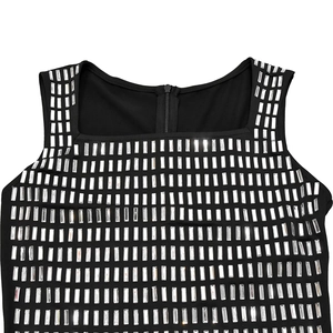 Detail of black party dress featuring square neckline with sparkling rhinestones and zipper