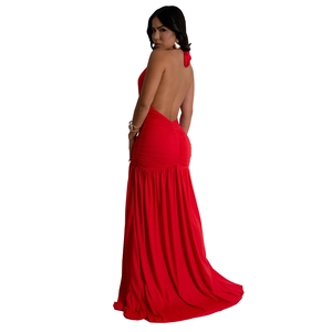 Detail of sexy red halter neck dress with deep V-neck and elegant pleats for evening party