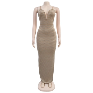 Close-up of sparkling rhinestones on a deep V-neck khaki slim fit dress details