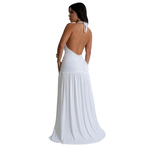 Detail of elegant white halter neck maxi dress featuring a sexy open back and pleated skirt