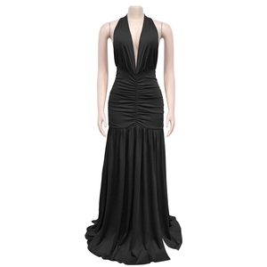 Detail of elegant black halter dress with deep V-neck and ruched waistline feature