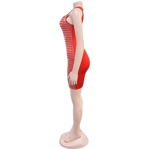 Detail of red bodycon mini dress featuring silver square rhinestone grid pattern