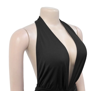 Detail of elegant black deep V-neck halter design with silky matte finish on a dress