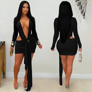 Detail of black long sleeve mini dress featuring deep V-neck, waist cut-outs and streamers