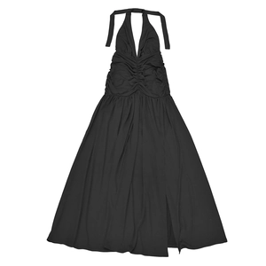 Detail view of the deep V-neckline and ruched bodice on this black halter maxi dress