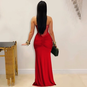 Detailed back view of a red strapless dress featuring elegant ruching and bodycon fit