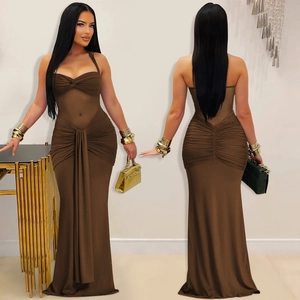 Detail of coffee brown halter gown featuring front knot and ruched floor-length skirt