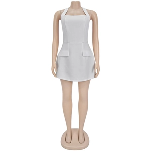 Detailed front view of white halter neck mini dress with decorative faux pockets
