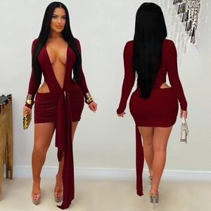 Detail view of burgundy V-neck mini dress with waist cut-outs and long decorative ribbons