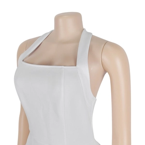 Detailed close-up of white off-the-shoulder halter dress with premium elastic fabric texture