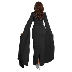 Detail view of the elegant back slit and long floor-length cape sleeves on a black dress