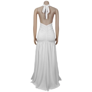 Detail of white backless maxi dress with halter bow tie and ruched pleated textures