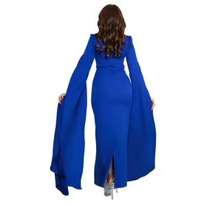 Detail of elegant royal blue evening gown with dramatic floor-length cape sleeves
