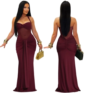 Detail of burgundy halter mesh maxi dress featuring sheer cut-outs and pleated textures