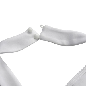 Detail of white off-shoulder dress featuring double button closure and elastic loops