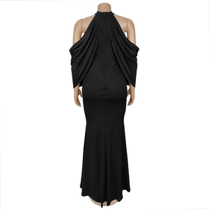 Detail of elegant backless halter dress with cascading drapes and slim fit silhouette