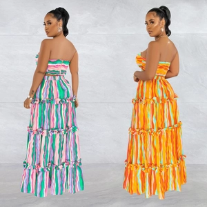 Women's chic two-piece striped tube top and tiered maxi skirt set for summer beach vacation