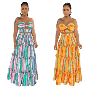 Women's 2-piece strapless crop top and tiered maxi skirt set with vibrant vertical stripes