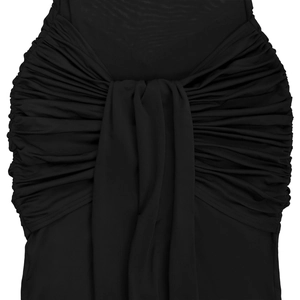 Detail of elegant black ruched dress fabric with sculptural draping and soft texture