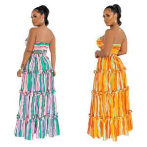 Detail view of colorful striped tube top and tiered maxi skirt set for women