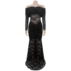 Close-up of black off-the-shoulder evening dress with sheer floral lace and ruched details