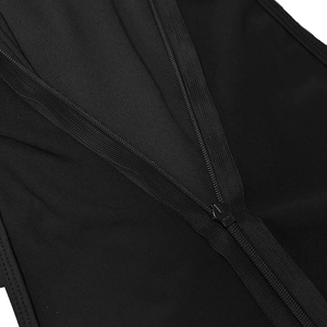 Detailed macro view of the seamless black invisible zipper and knit fabric on dress
