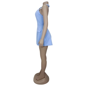 Side view of light blue halter neck mini dress with decorative waist pocket detail