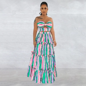 Women's two-piece striped strapless crop top and high-waist tiered maxi skirt set