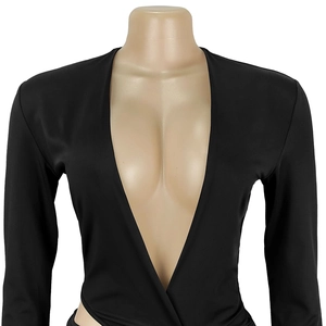 Detail of black deep V-neck long sleeve bodysuit in high-stretch knit fabric