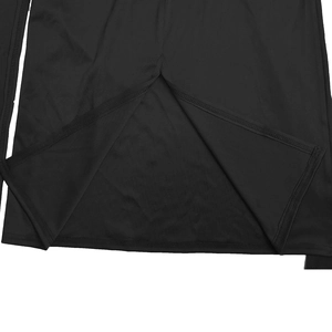 Detail shot of the back slit hem on a black dress with professional double-needle stitching
