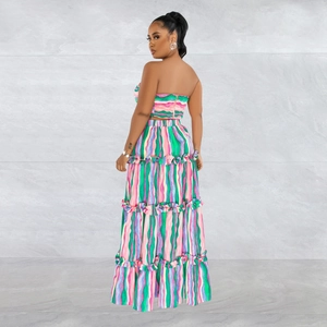 Detail view of colorful striped two-piece set with ruffled maxi skirt and strapless top
