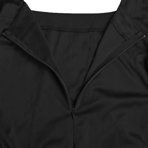 Detail of invisible back zipper on black dress showing high-quality stitching and fabric