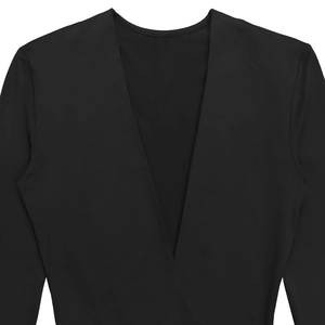 Detail of elegant black deep V-neckline dress with smooth premium knitted texture