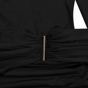 Macro shot of elegant gathered fabric details with a premium gold metal buckle