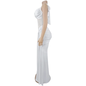 Detail of white halter neck dress featuring side ruching and silky mesh fabric