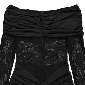 Detail of off-shoulder black lace dress featuring intricate floral crochet and ruched neckline