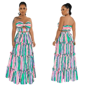 Detail of striped tube top with bow and tiered maxi skirt set for summer beachwear