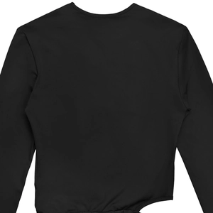 Detail view of the black knit top featuring a unique irregular cutout on the lower back
