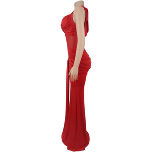 Detail of red halter neck dress with gathered bodice and elegant ruched fabric texture