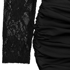 Detail of elegant black floral lace sleeve and side ruched fabric on sexy dress