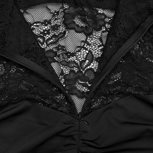 Detail of floral lace stitching with an invisible zipper and ruching on a black dress