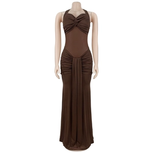 Detail view of brown halter dress featuring mesh patchwork and pleated texture design