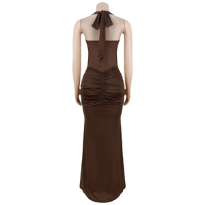 Detail view of the back of a dark brown ruched halter maxi dress with neck ties