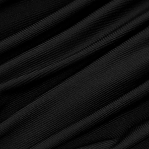 Close-up of black ribbed knit fabric showing detailed vertical stripe texture and soft folds