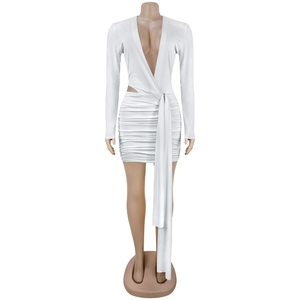 Detail of white deep V-neck mini dress with ruched fabric and side cutout design