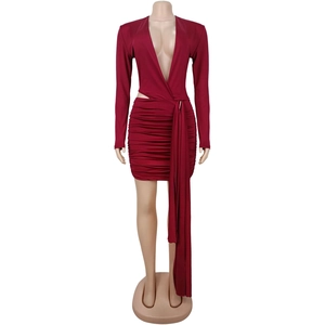 Detail of burgundy V-neck mini dress with ruched fabric and waist cut-out feature