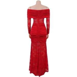 Detail of red off-shoulder lace dress with elegant mermaid hem and ruched fabric