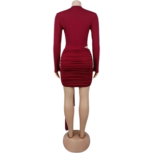 Back view of a burgundy long-sleeve bodycon dress with side cutout and ruching detail