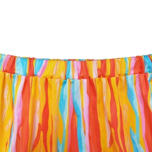 Close-up of the elastic waistband and vibrant vertical stripes on this summer skirt