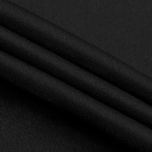 Gros plan sur la texture du tissu en polyester noir montrant le tissage fin et les détails